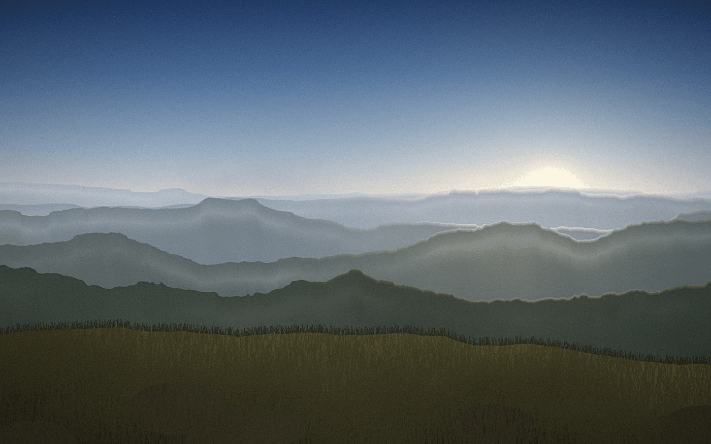 Layered mountain ridges of the Drakensberg escarpment in morning mist above a grassy foreground slope